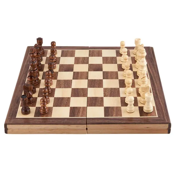 A wooden chess board with all pieces in the starting position